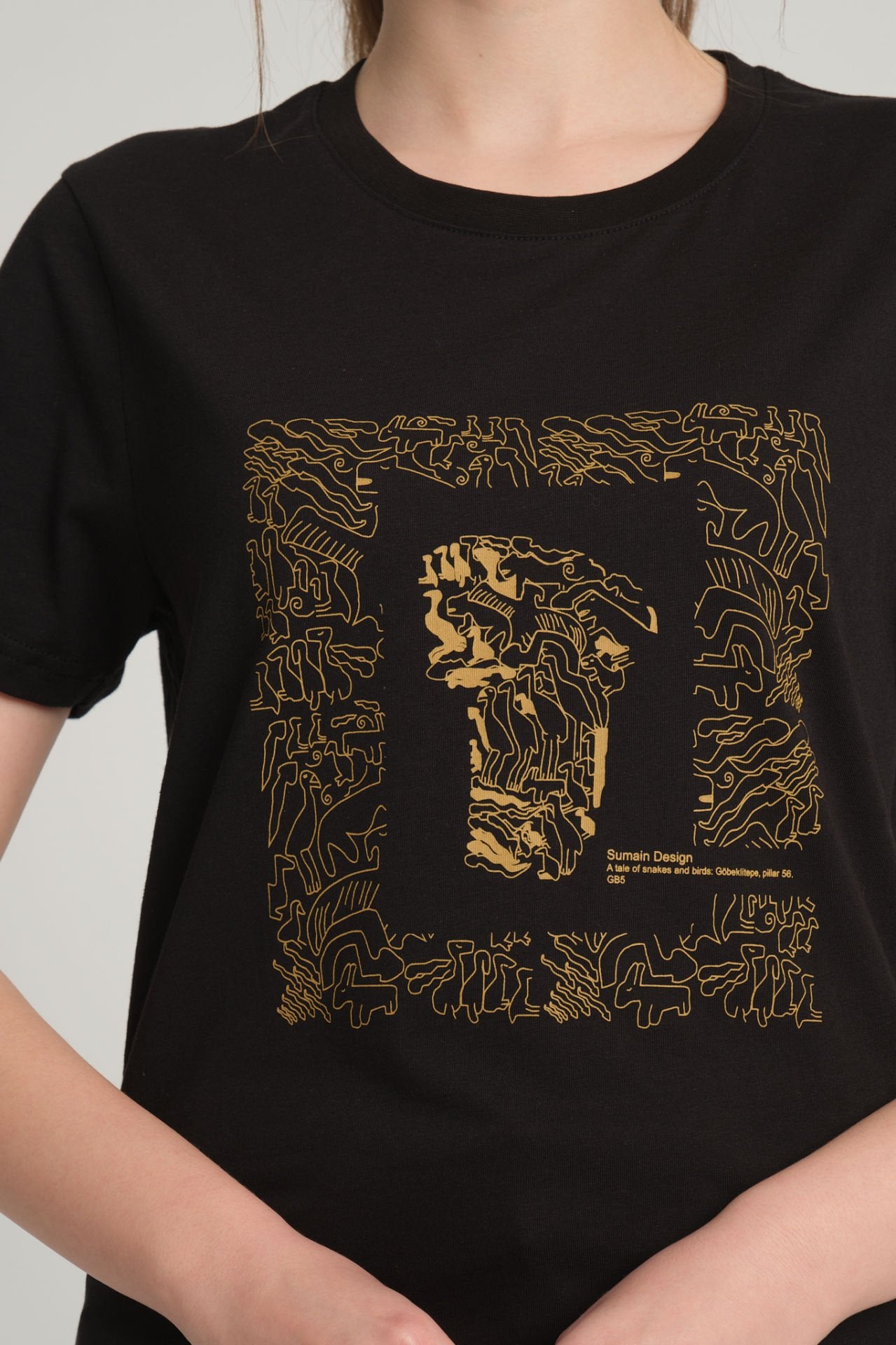 Women's Black T-Shirt with Göbeklitepe Print ''The Story of Snakes and Birds''
